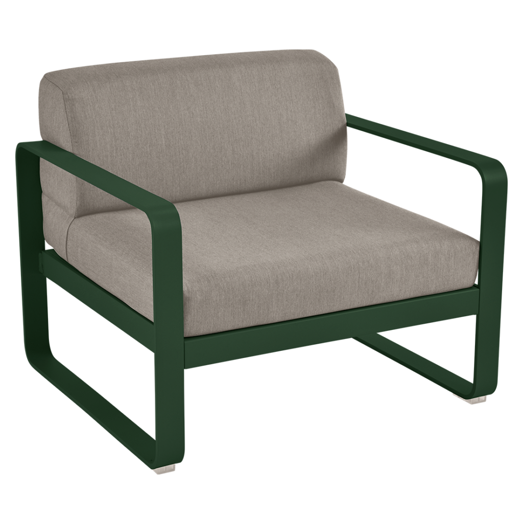 Une chaise longue verte avec un coussin beige.