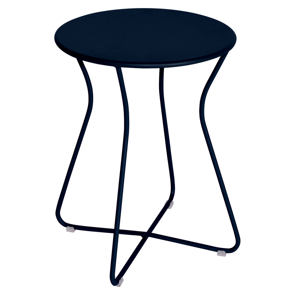 Une table ronde en métal avec un piètement noir, également connue sous le nom de "Tabouret Cocotte".