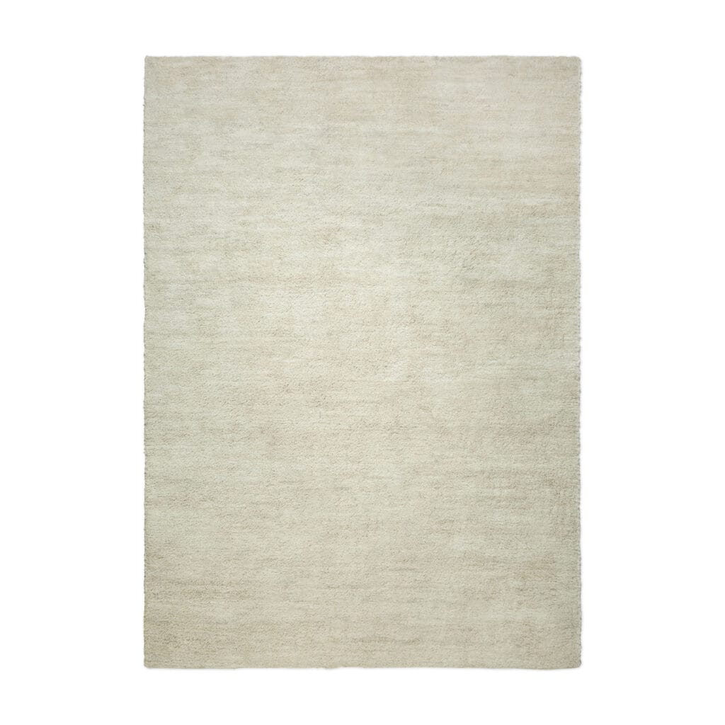 Un tapis couleur Cumin sur fond blanc.