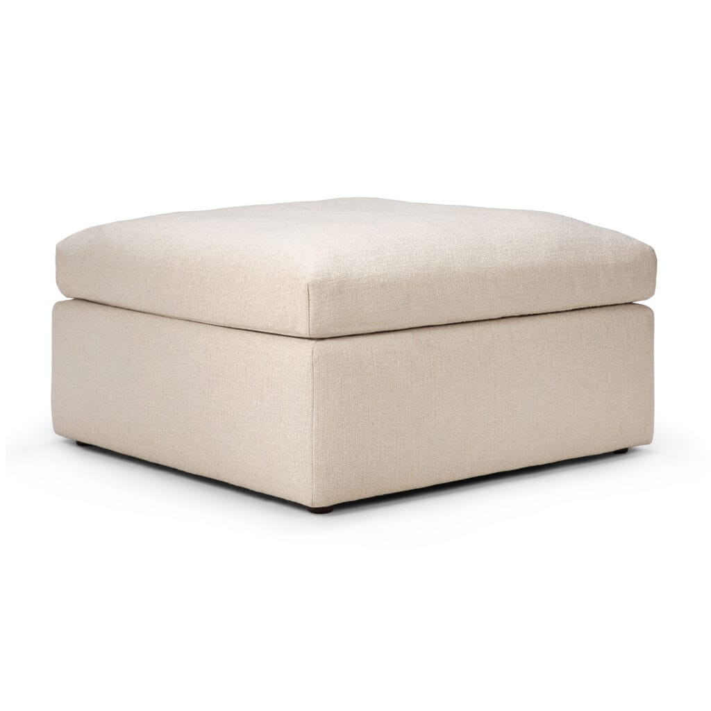 Un Canapé Mellow, module 1 place, pouf sur fond blanc.