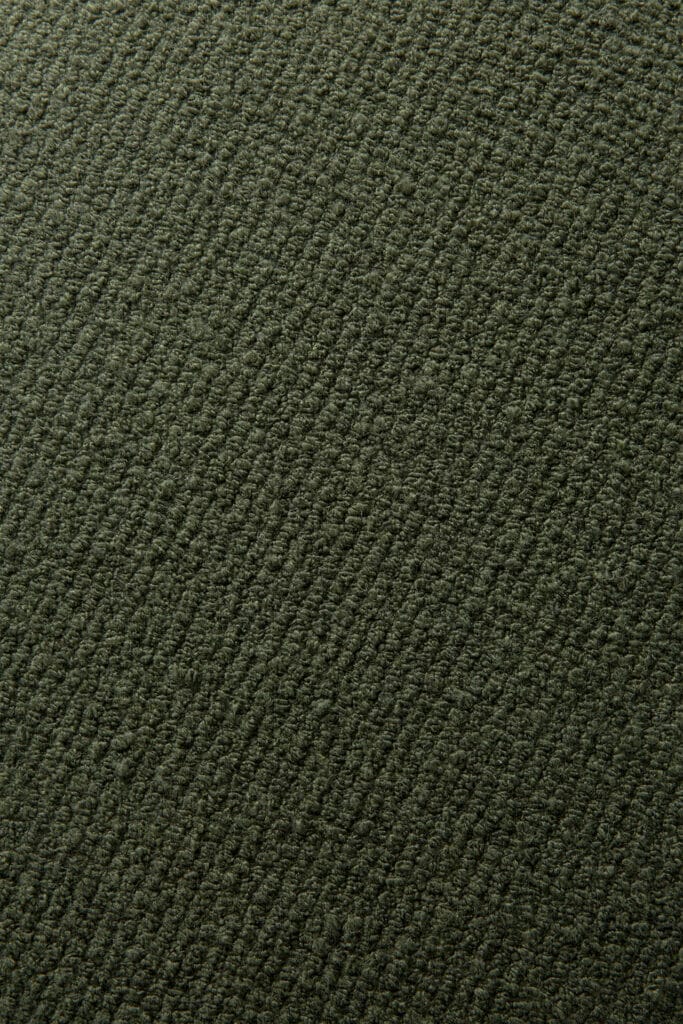 Image en gros plan d'un tissu vert foncé avec une texture Canapé Mellow, module 1 place.