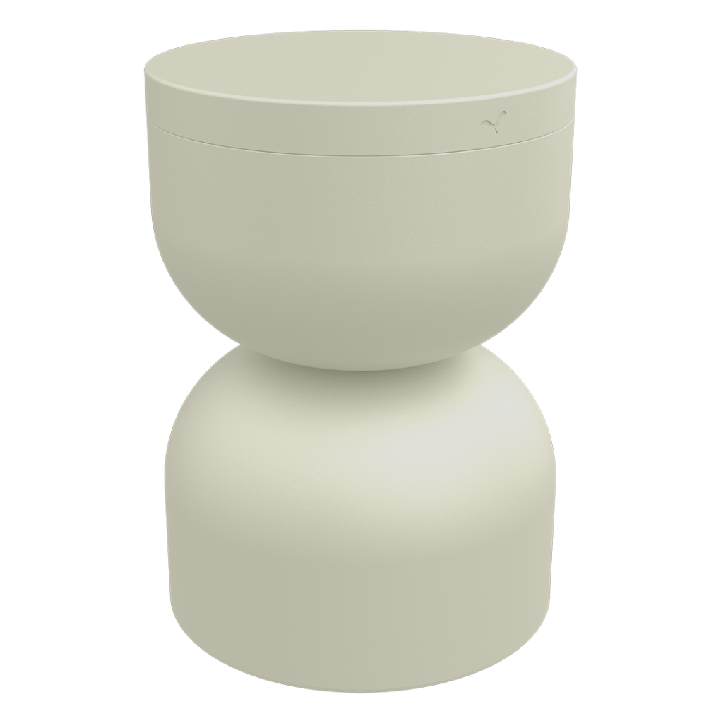 Un tabouret blanc sur fond noir.