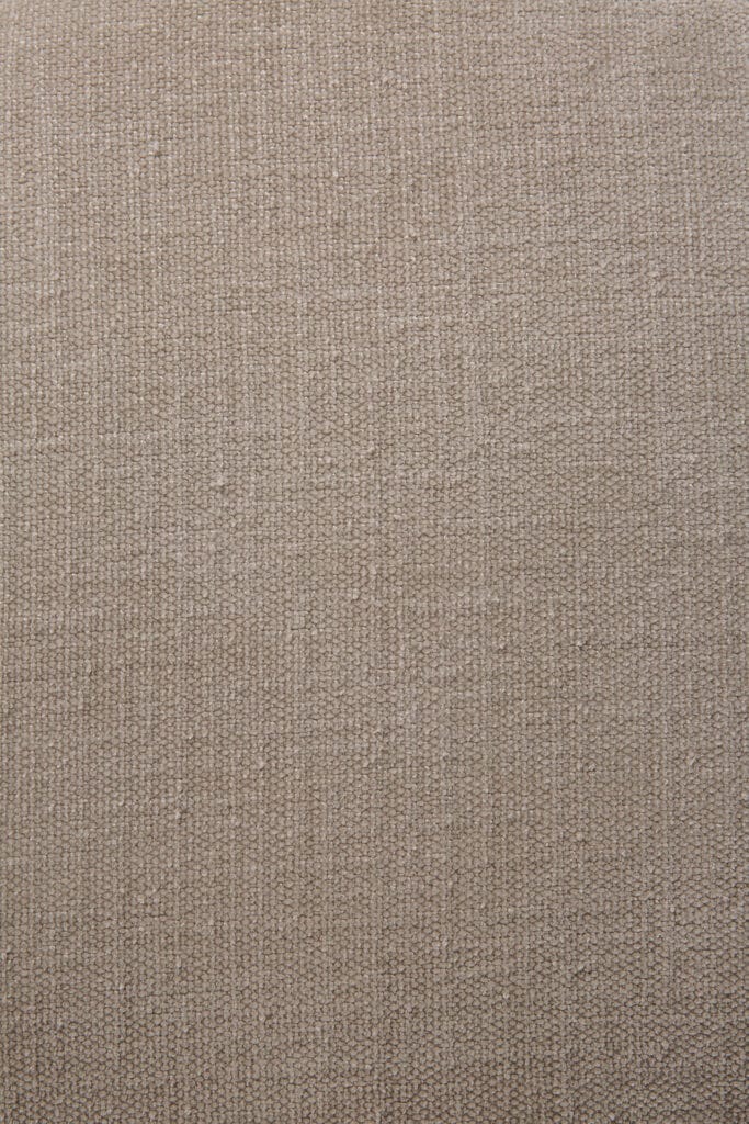 Gros plan d'un tissu beige comportant un pouf Roller Max.