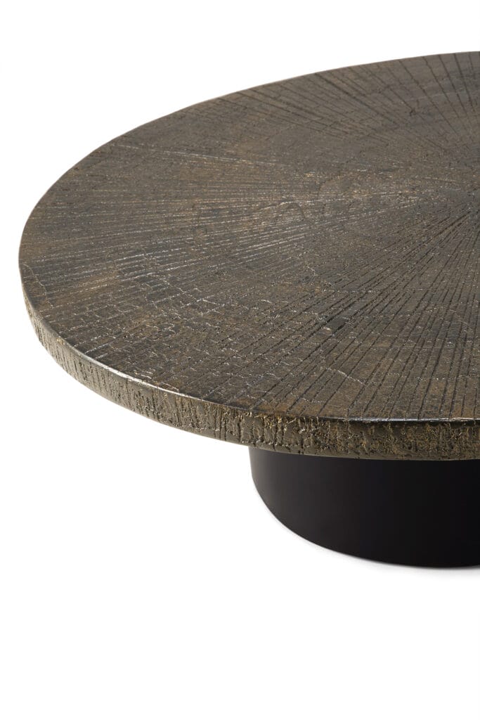 Une table basse ronde avec une base Table basse Slice.