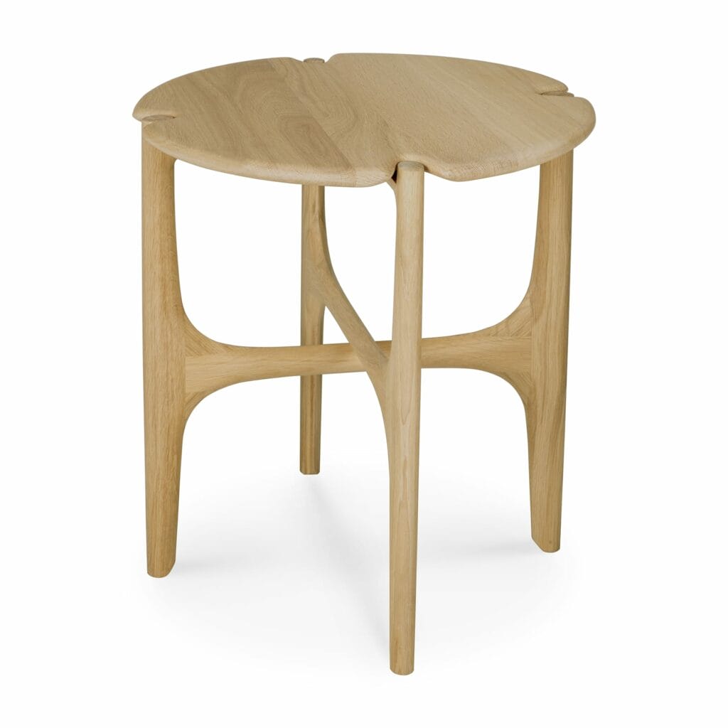 Une table d'appoint en bois en forme de PI avec un plateau circulaire.