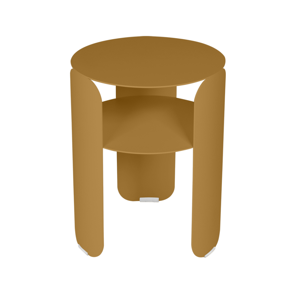 Vue de dessus d'une table ronde moderne en bois avec un design de base complexe.