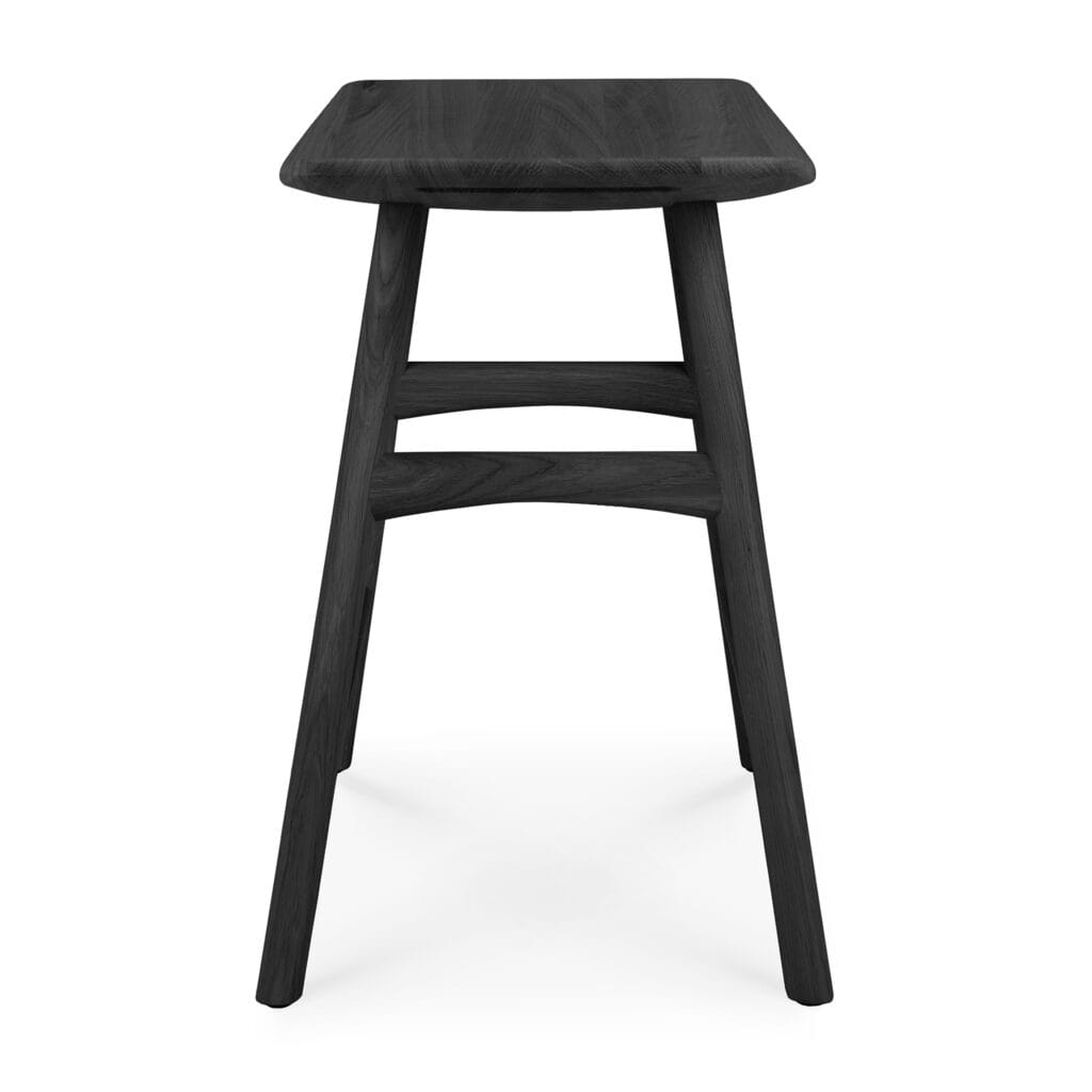 Un Tabouret Osso noir sur fond blanc.
