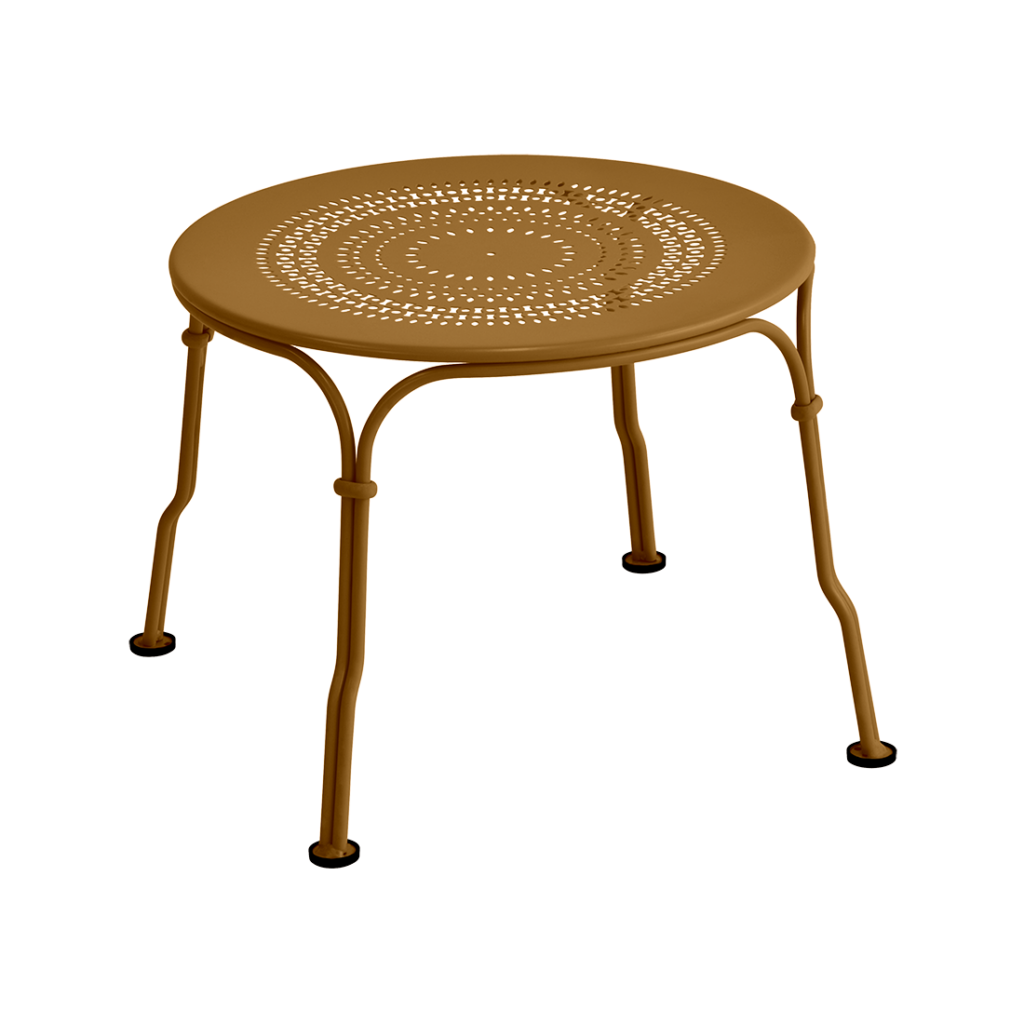 Une table ronde avec une base en métal inspirée du design des années 1900.
