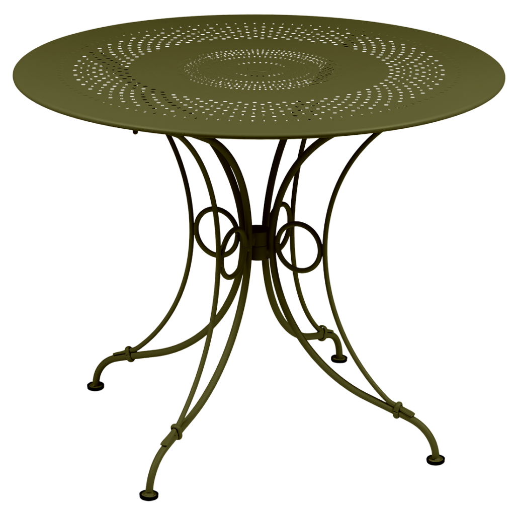 Une table ronde avec un piètement en métal vert.
