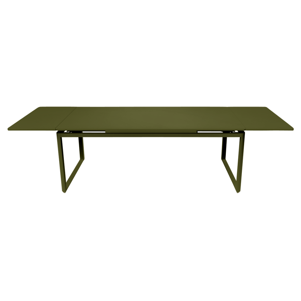 Cette table à manger présente une structure en métal et est colorée dans une nuance de vert vibrante.