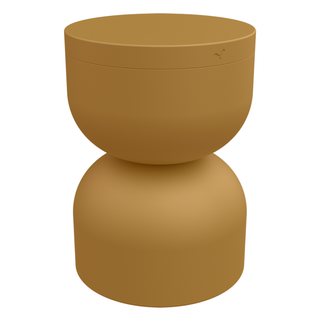 Un tabouret en forme de couleur beige sur fond blanc, rappelant le Pain d'épices.