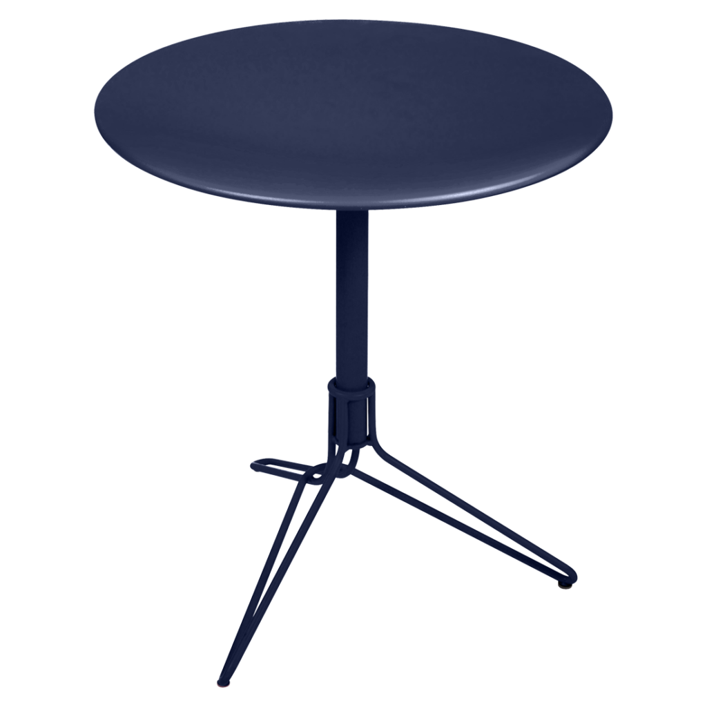 Table noire de style Guéridon à piétement guéridon, vue de dessus, sur fond rayé.