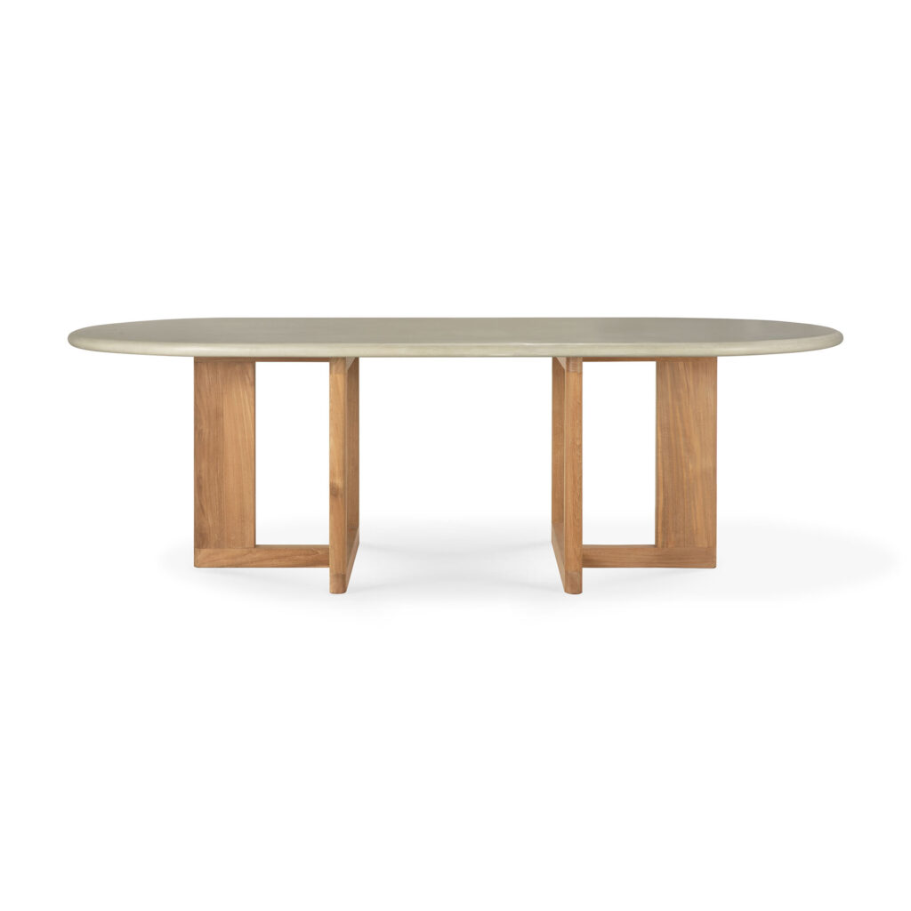 La table à manger d'extérieur Trestle est dotée d'un plateau rectangulaire en bois avec une base de support géométrique, idéale pour les environnements intérieurs élégants et les repas en extérieur polyvalents.