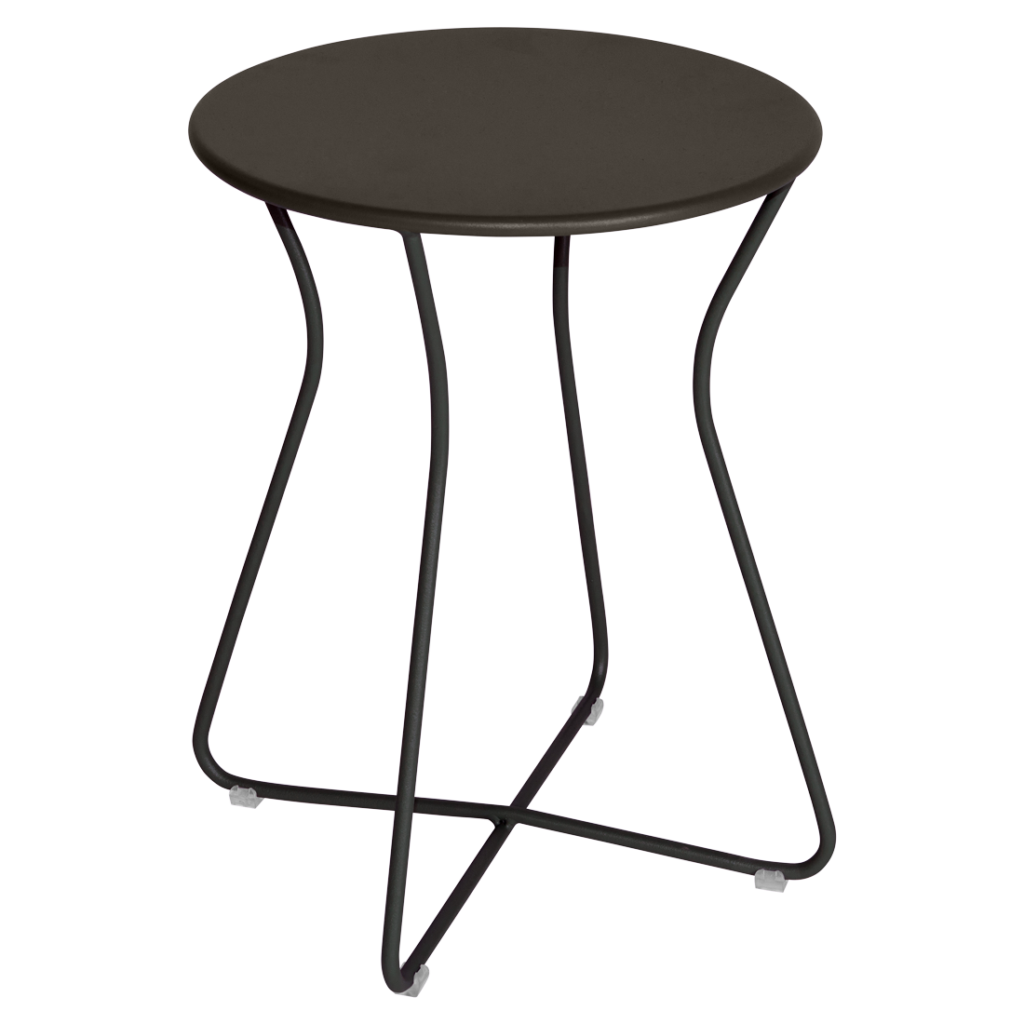 Petite table d'appoint ronde Tabouret Cocotte en Bleu Maya avec des pieds fins et courbés et un plateau plat, sur fond violet clair.
