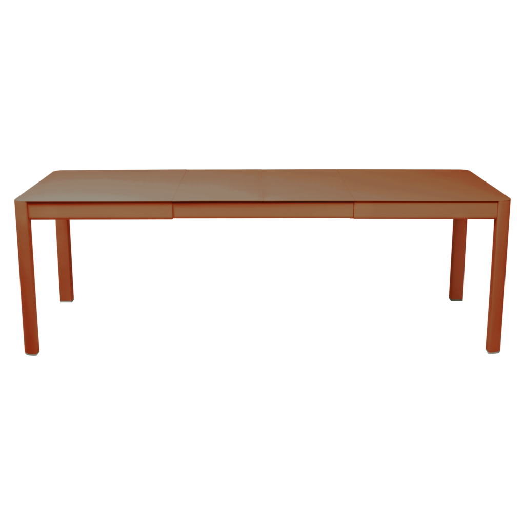 Table rectangulaire orange Ribambelle à pieds droits, photographiée sur fond uni.