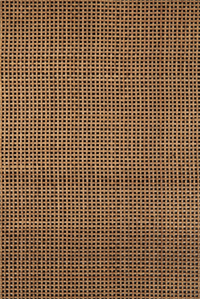 Gros plan sur un tissu marron à motif quadrillé, idéal pour ajouter des détails texturés à la table d'appoint Panel.