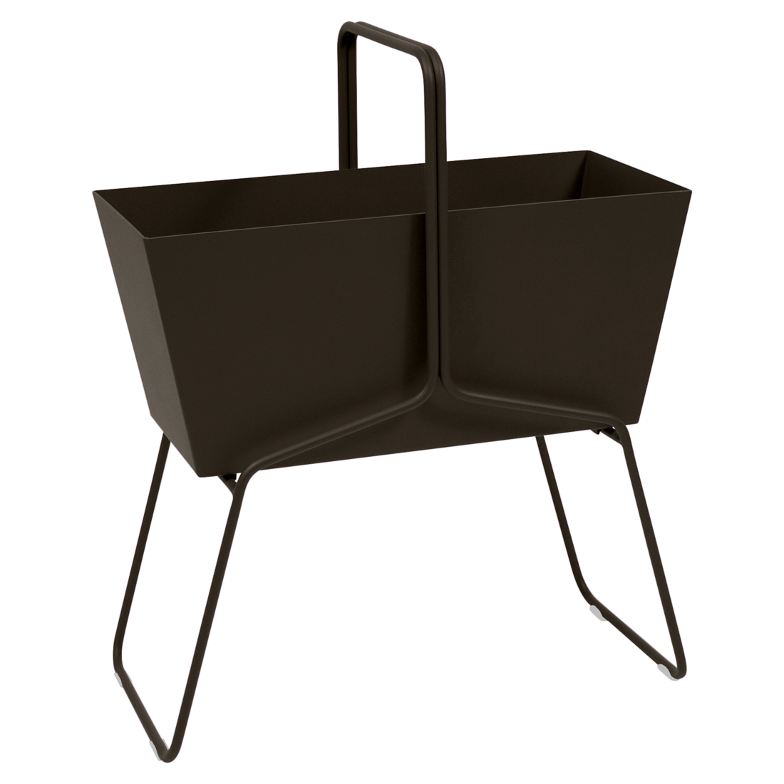 Un porte-revues en métal noir avec un support rectangulaire de style panier, une poignée centrale et des pieds inclinés, sur un fond violet clair.