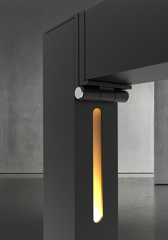 Gros plan sur le pied de table TWIG FS - Midnight (230V, EU) en noir, qui présente une fente verticale avec une lumière jaune chaude, sur un fond gris minimaliste - idéal pour insuffler l'élégance de minuit dans tout intérieur moderne.