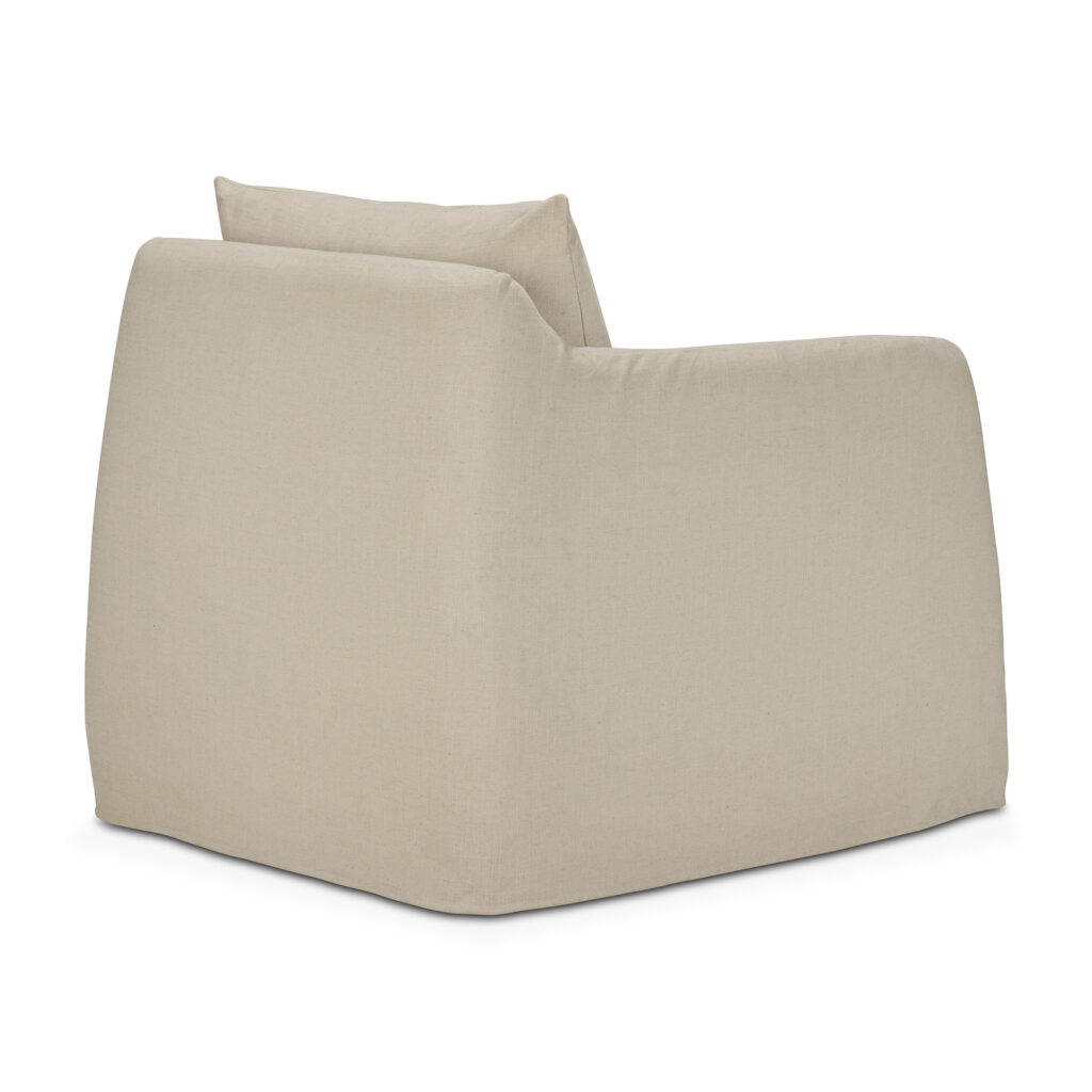 Chaise longue de couleur osseuse, vue de dos et de côté, avec une forme carrée et un coussin de dossier lâche.