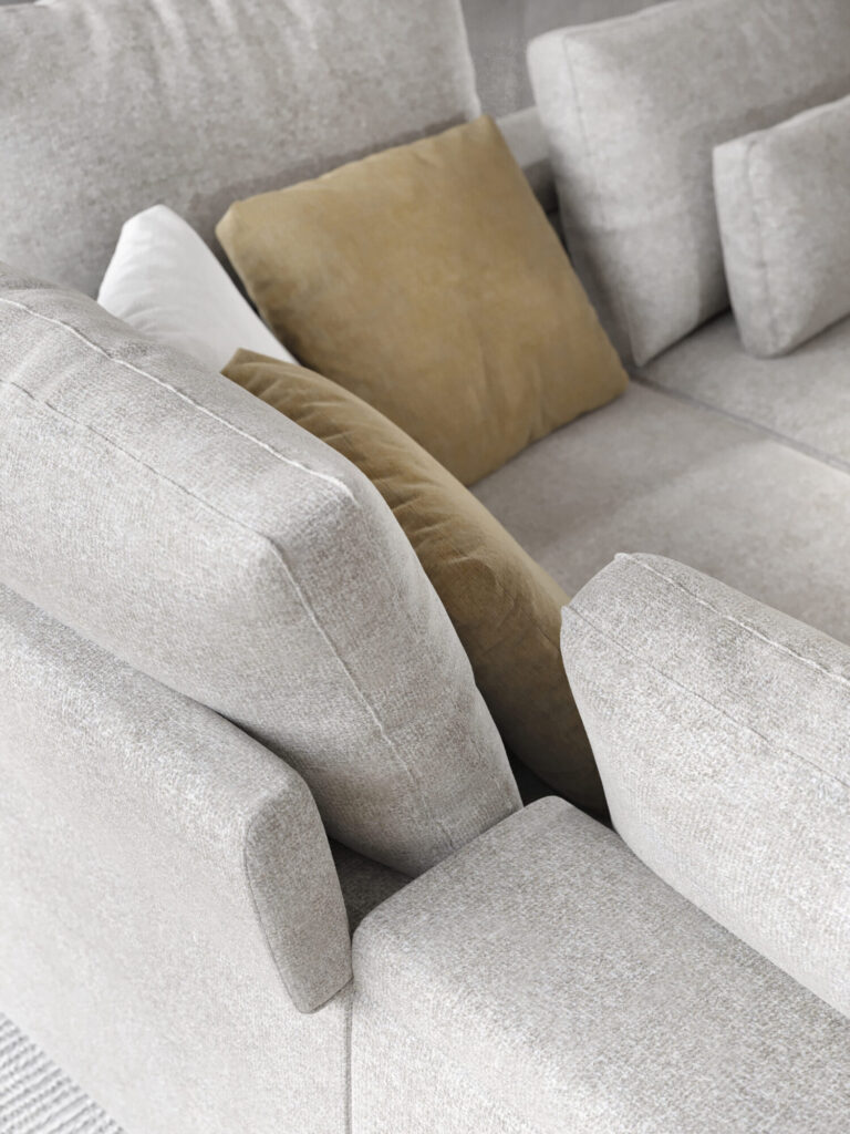 Gros plan du Canapé Willow [4z-Nzz-4z] - C25 Perfect Harmony en tissu gris clair avec deux coussins beiges et un blanc disposés le long du dossier.