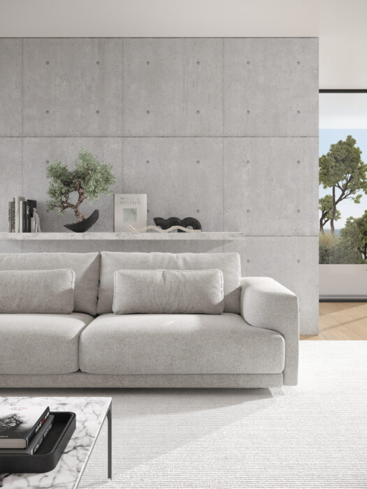 Salon moderne avec le canapé Willow [4z-Nzz-4z] en C25 Perfect Harmony, avec un mur en béton, un décor minimaliste et une grande fenêtre avec vue sur les arbres.