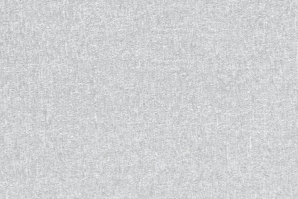 Le tissu texturé gris clair avec un motif tissé fin et cohérent crée une toile de fond confortable, idéale pour le Sumo - Loveseat.